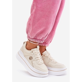 Women's sports shoes on the platform beige 1