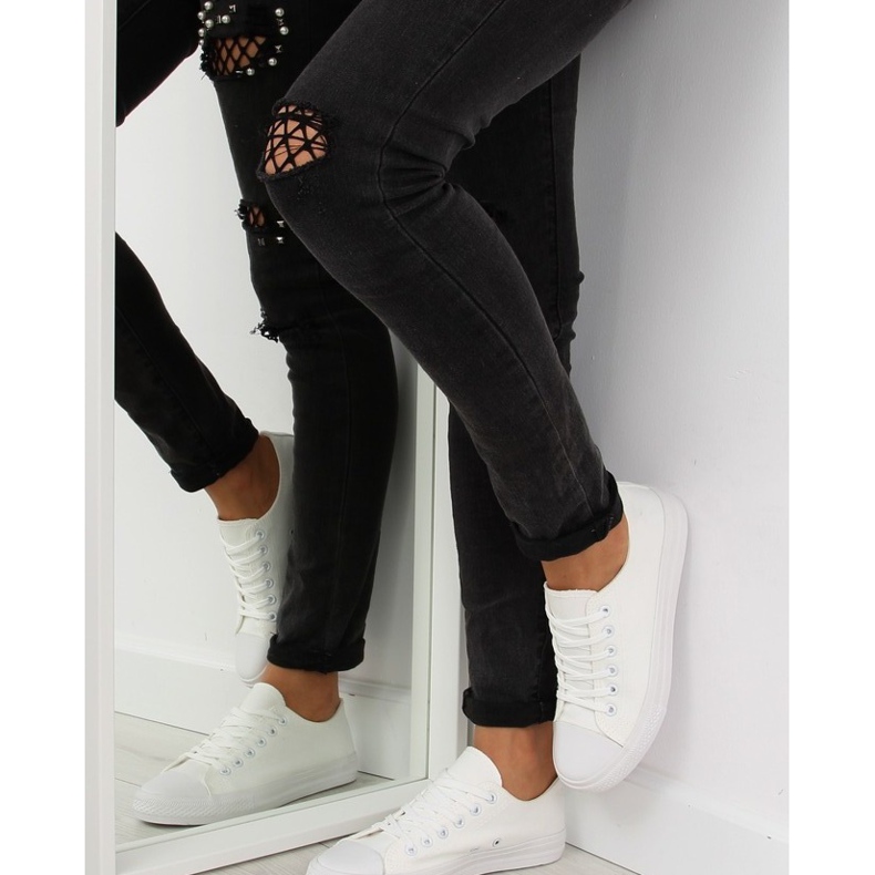 Women's white monocolour sneakers 1