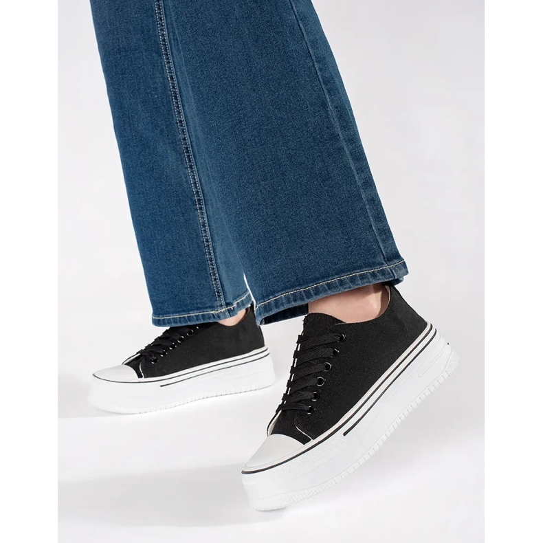 Black women's sneakers with a thick sole 1 Black women's sneakers with a thick sole 1