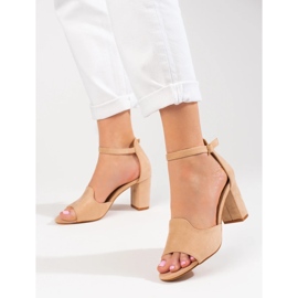 Women's beige sandals on the post by W. Potocki 2