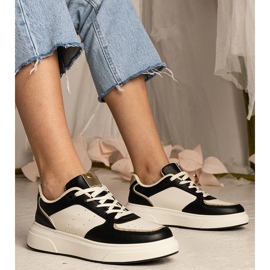 Black women's sneakers with a glitter accessory 1