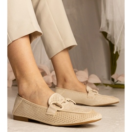 Beige women's openwork loafers with an ornament 1