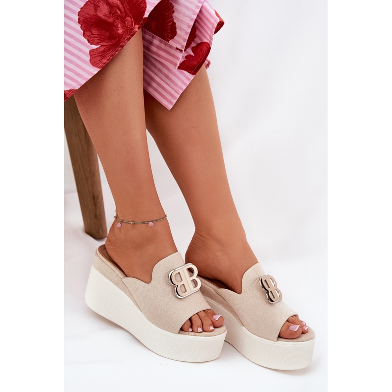 Slippers on the platform and wedges with beige ornament 1