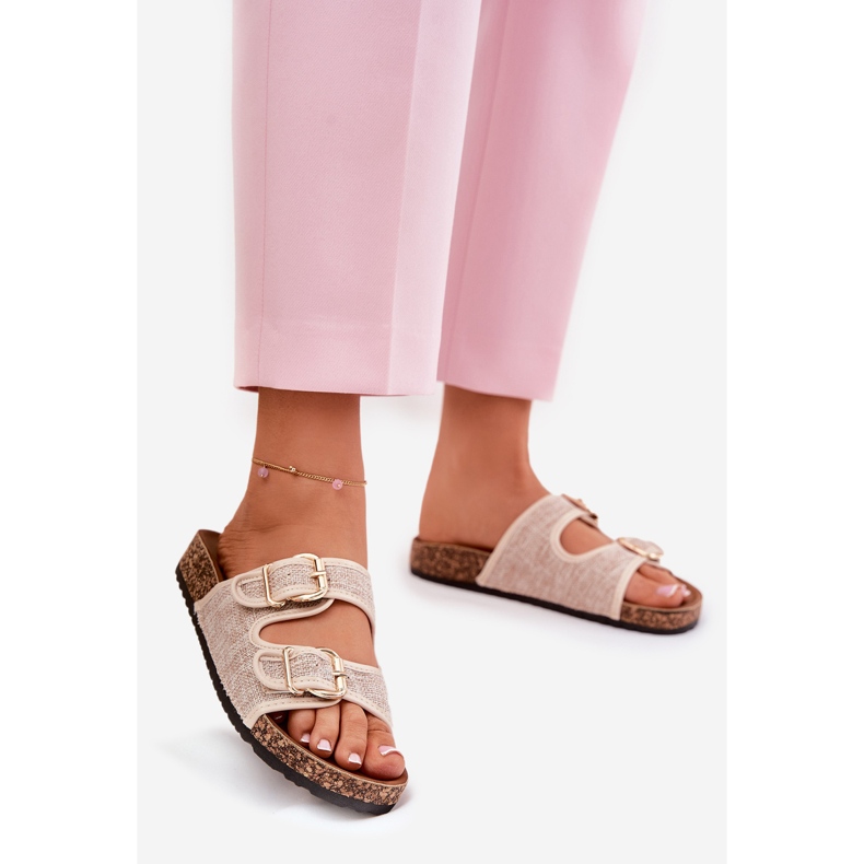 Women's material flip flops on a cork platform with beige buckles 1