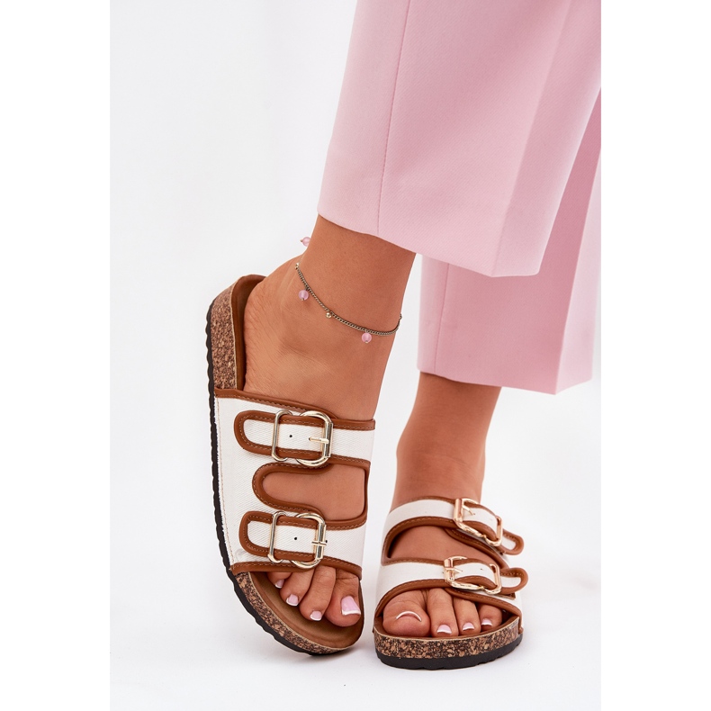 Women's material flip flops on a cork platform with white buckles 2