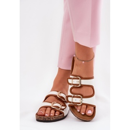 Women's material flip flops on a cork platform with white buckles 3