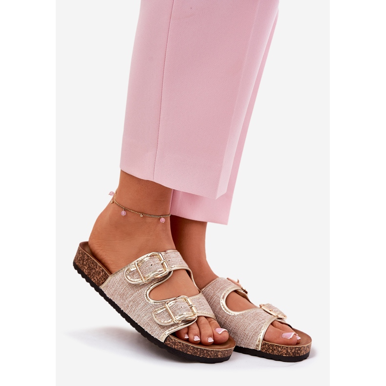 Women's material flip flops on a cork platform with golden buckles 1