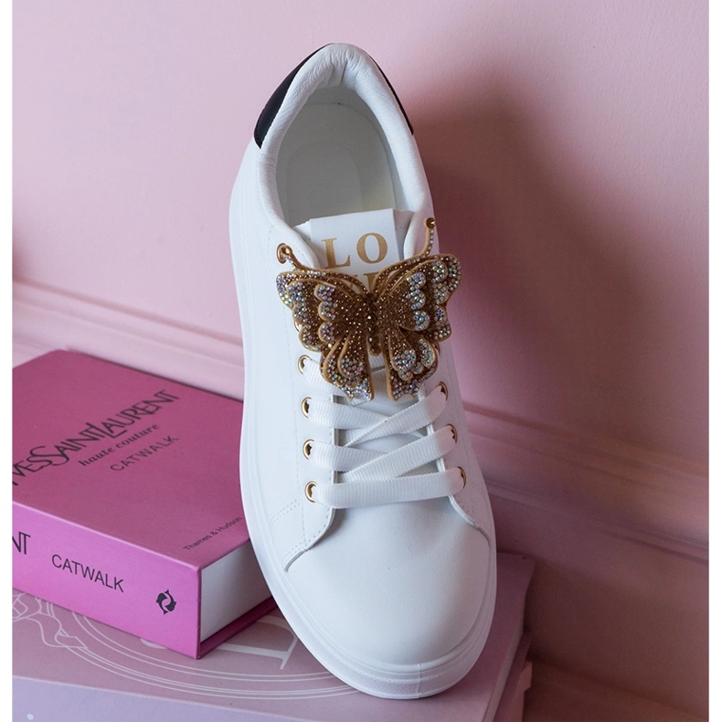 Black and white sneakers decorated with a butterfly with zircons 1