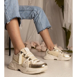 Beige women's sneakers on a massive sole 1