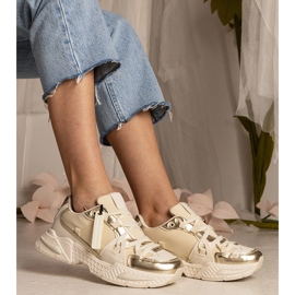 Beige women's sneakers on a massive sole 2