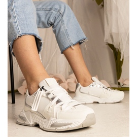 White women's sneakers with a massive sole 1 White women's sneakers with a massive sole 1