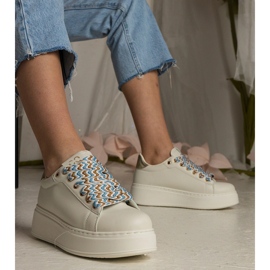 Beige women's sneakers with massive lacing 2
