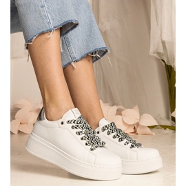 White women's sneakers with massive lacing 1