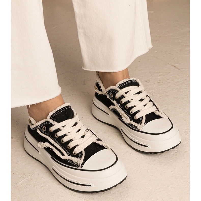 Black women's sneakers on a high sole 1 Black women's sneakers on a high sole 1