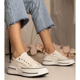 White women's sneakers on a high sole 1