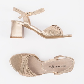 Goodin Golden elegant sandals on a low post 3