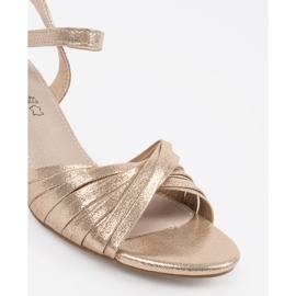 Goodin Golden elegant sandals on a low post 4