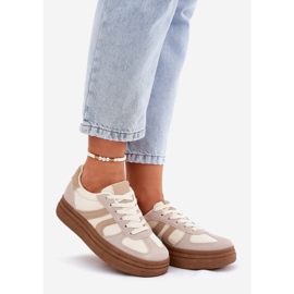 Women's sneakers on the platform dark beige 1