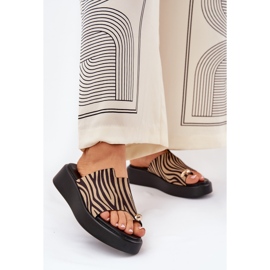 Women's flip flops on the platform and low wedges with a decorative detail of black and beige 2