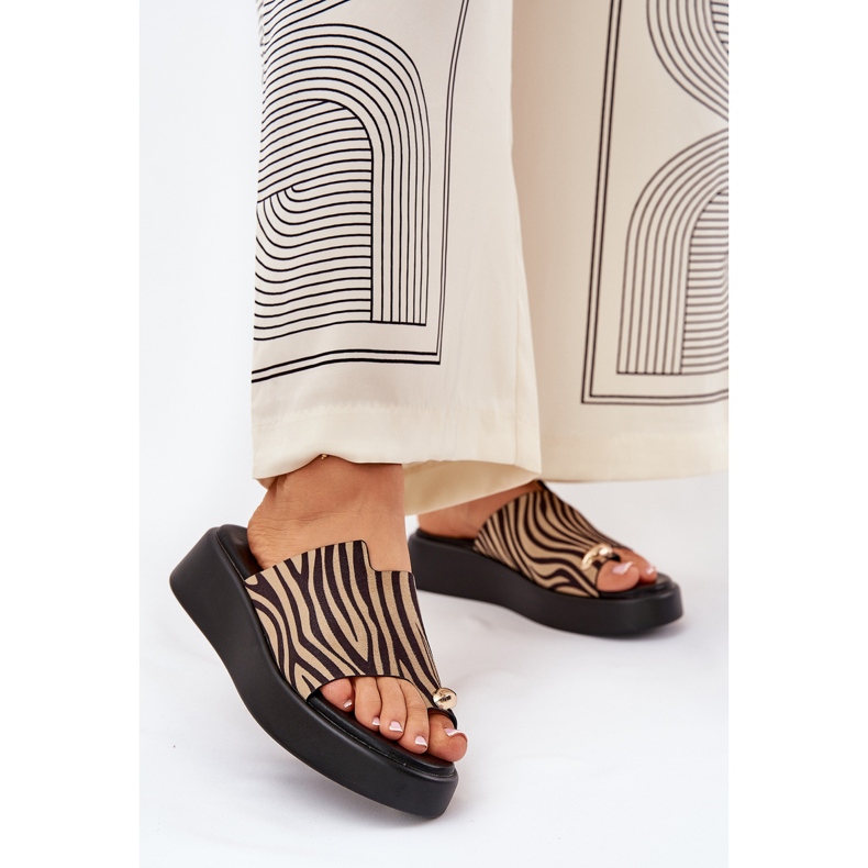 Women's flip flops on the platform and low wedges with a decorative detail of black and beige 2