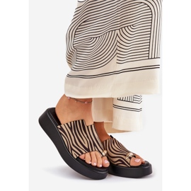 Women's flip flops on the platform and low wedges with a decorative detail of black and beige 1