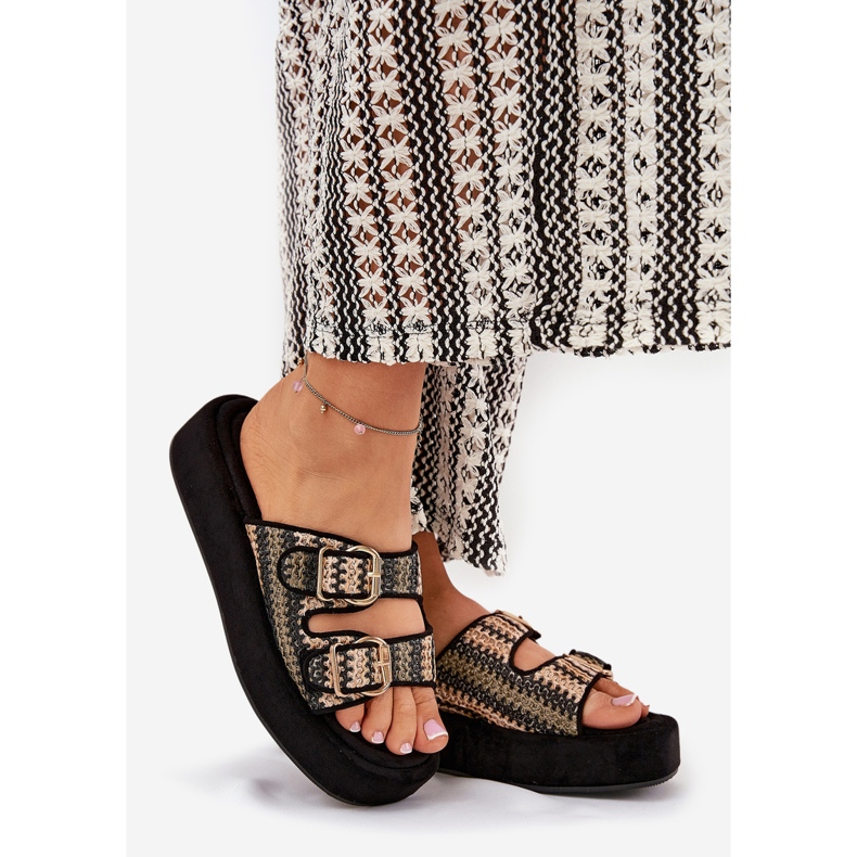 Women's flip flops on the platform with buckles and black braid 1