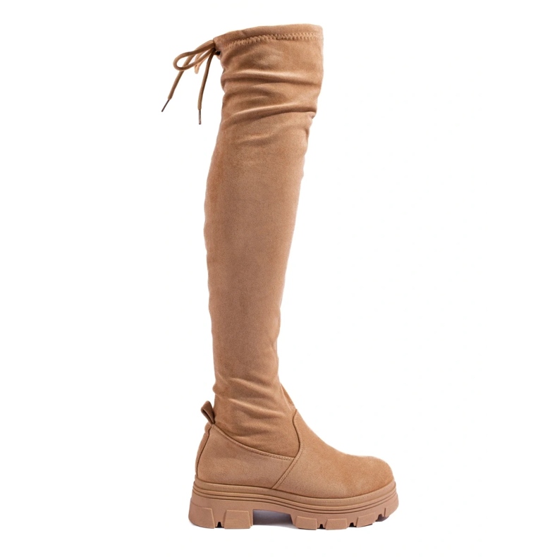 Women's thigh-high boots on a beige platform 1