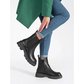 Women's black Chelsea boots on the platform 1