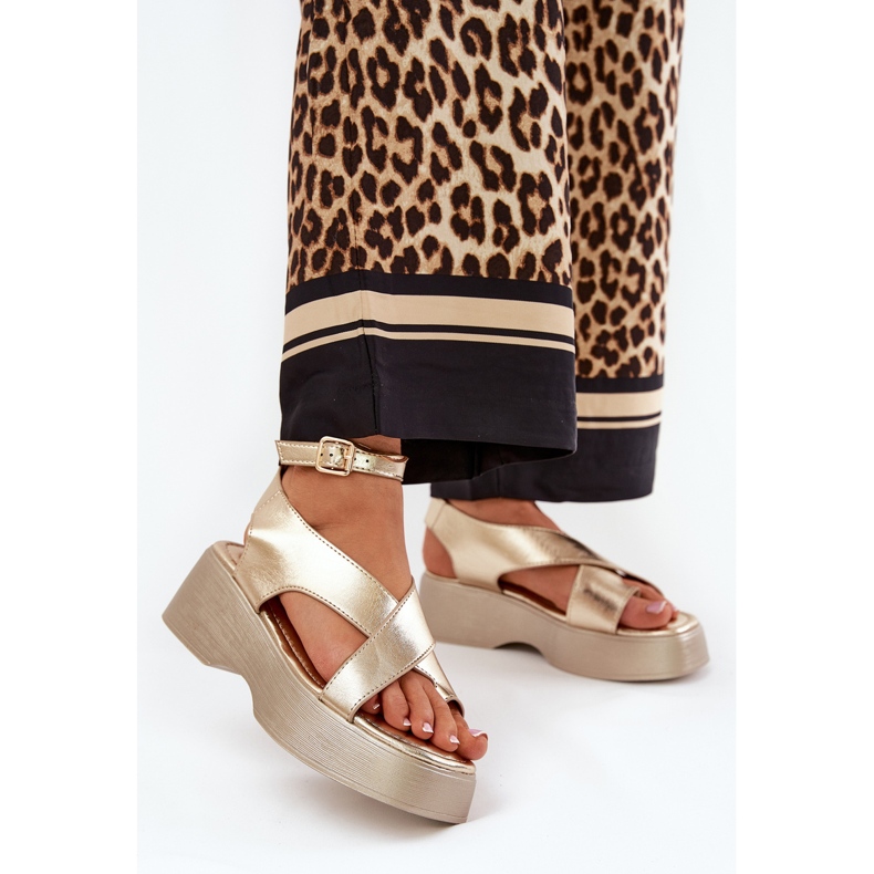 Women's sandals on platform and an wedge of Eco leather golden 2