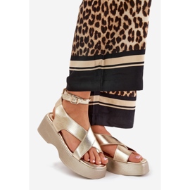 Women's sandals on platform and an wedge of Eco leather golden 1