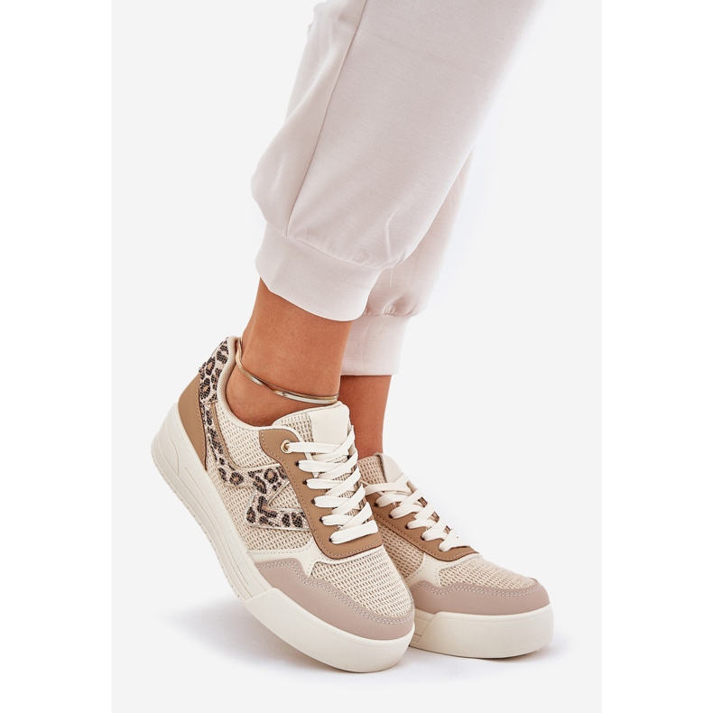 Women's sports shoes on the platform leopard khaki beige 1