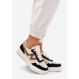 Women's sports shoes on the platform leopard print black 1