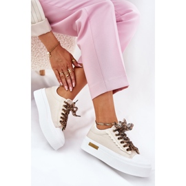 Women's sneakers on a massive platform with decorative lacing beige 1
