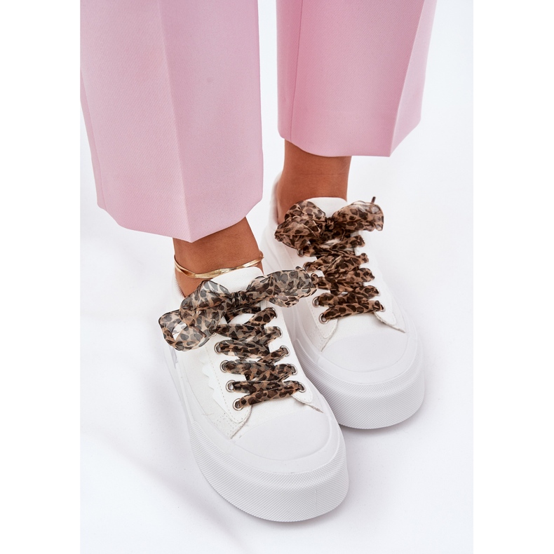 Women's sneakers on a massive platform with decorative lacing white 2 Women's sneakers on a massive platform with decorative lacing white 2