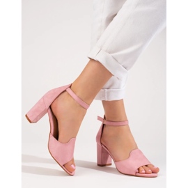 Women's pink sandals on the post by W. Potocki 2