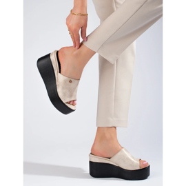 Metallic flip flops on a high wedge golden 2