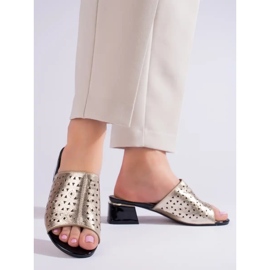 Gold women's openwork slippers with a low heel Shelvt golden 2 Gold women's openwork slippers with a low heel Shelvt golden 2