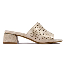 Openwork golden flip flops on a low metallic post 2