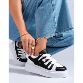 Black and white women's sneakers from Shelovet with a thick sole 1