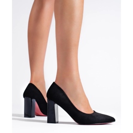 Ladies' black pumps on the post 1 Ladies' black pumps on the post 1