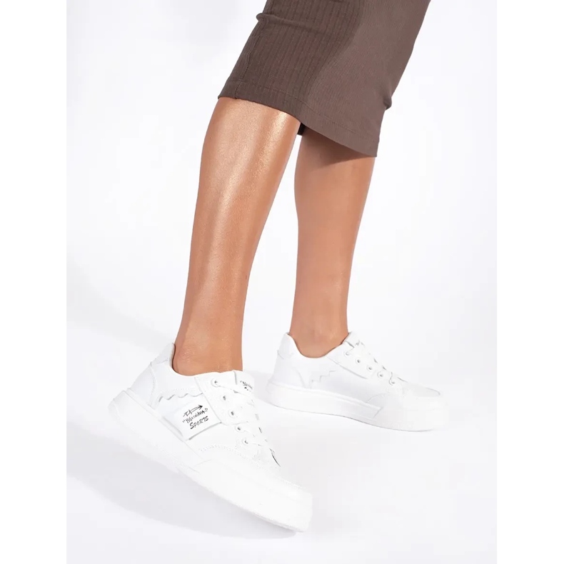 White sneakers on the platform 2