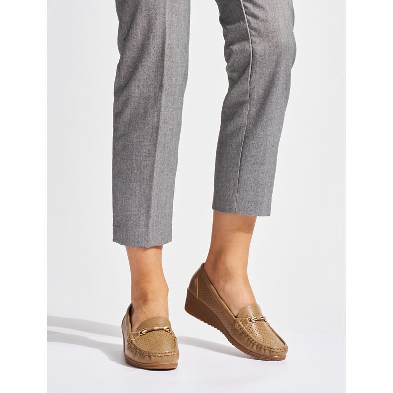 Brown openwork loafers with a low platform 1