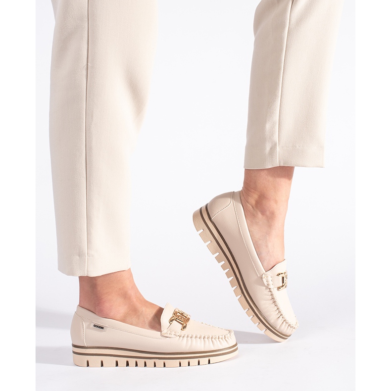 Beige women's loafers on the platform 1
