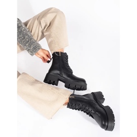 Black leather ankle boots with thick soles 1 Black leather ankle boots with thick soles 1