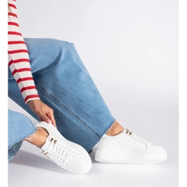 Leather white sneakers on the platform 1