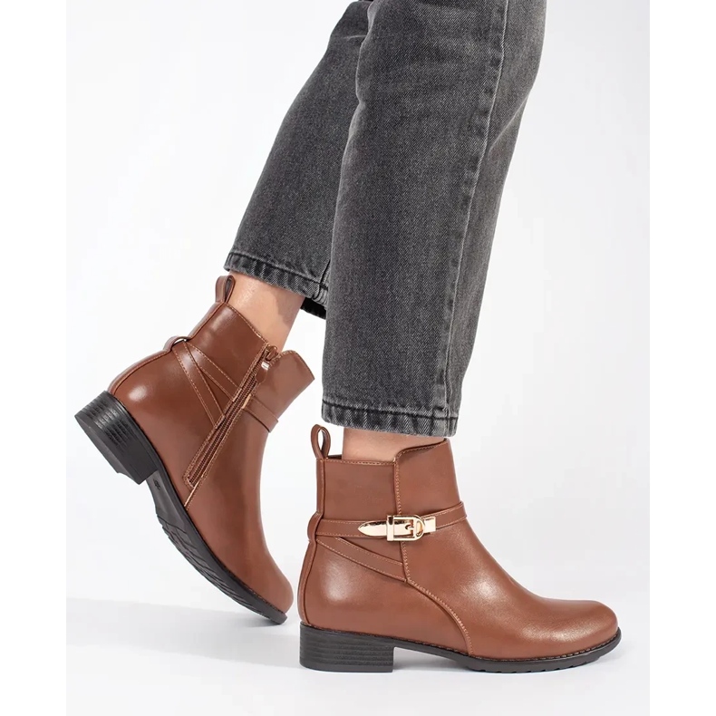 Brown women's low-heeled boots with a decorative strap 1 Brown women's low-heeled boots with a decorative strap 1