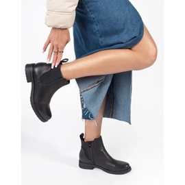 Women's black flat Chelsea boots 1