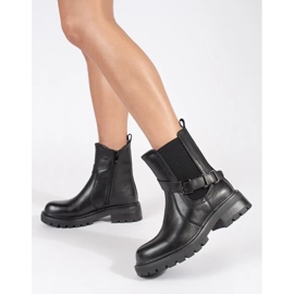 Women's black leather Chelsea boots on the Sergio Leone platform 1