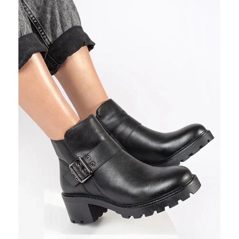 Black leather women's high-heeled ankle boots with a decorative buckle by Sergio Leone 1