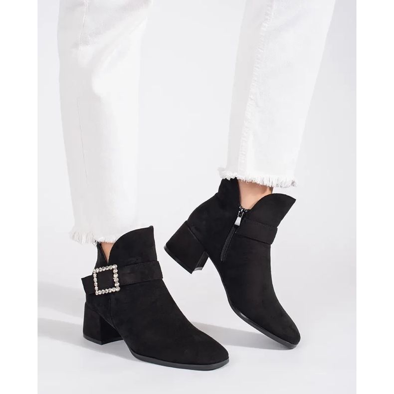 Women's black suede ankle boots with a silver buckle 1